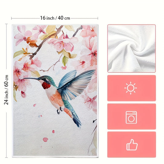 Two pieces of ultra soft kitchen towels featuring a vibrant hummingbird and blossom design. These highly absorbent dish hand towels are machine washable and perfect for contemporary coastal decor. Each towel measures 40.64x60.96 cm.