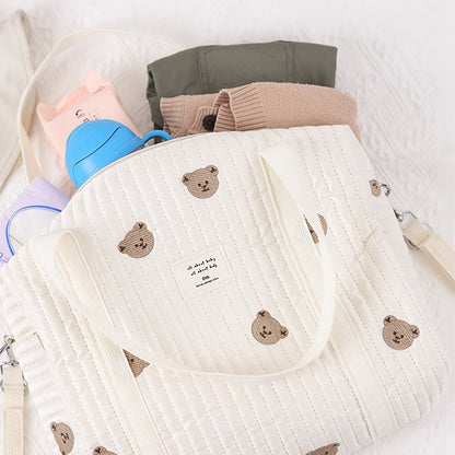 This Polyester Embroidered Shoulder Diaper Bag serves as a versatile storage solution for moms on the go. A perfect gift for Christmas, Halloween, Thanksgiving, New Year's, or Valentine's Day.