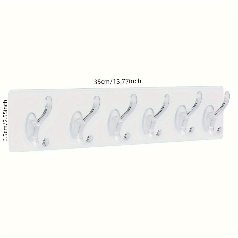 1 piece wall organizer with 6 hooks, no drilling required. Strong adhesive for wall-mounted clothes and hat storage. Great for kitchen, bathroom, and utility use.