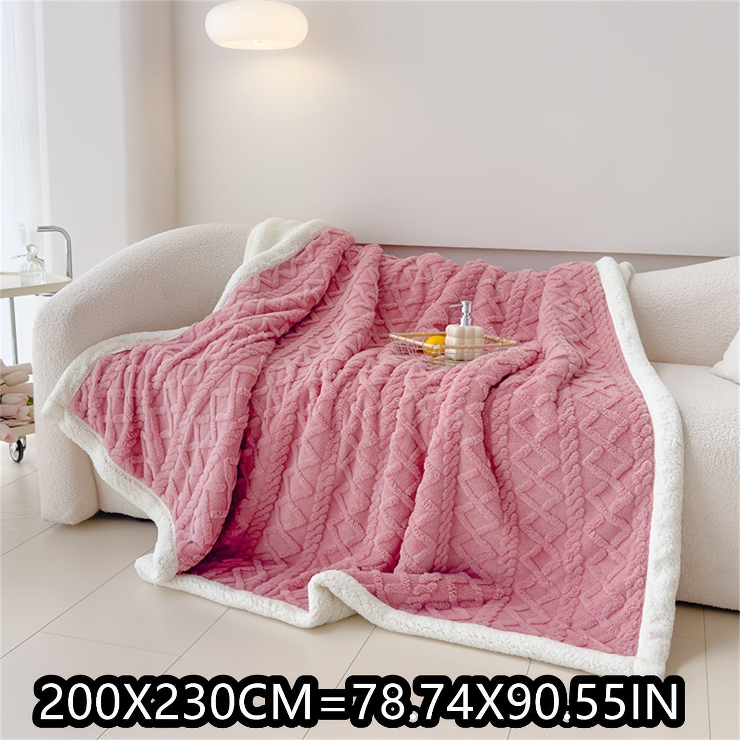 Soft cable-knit fleece blanket in blue, available in 150x200cm or 200x230cm sizes. Featuring a contemporary style, this blanket is machine washable and perfect for use in the bedroom, living room, office, or while camping during the winter. Made with a