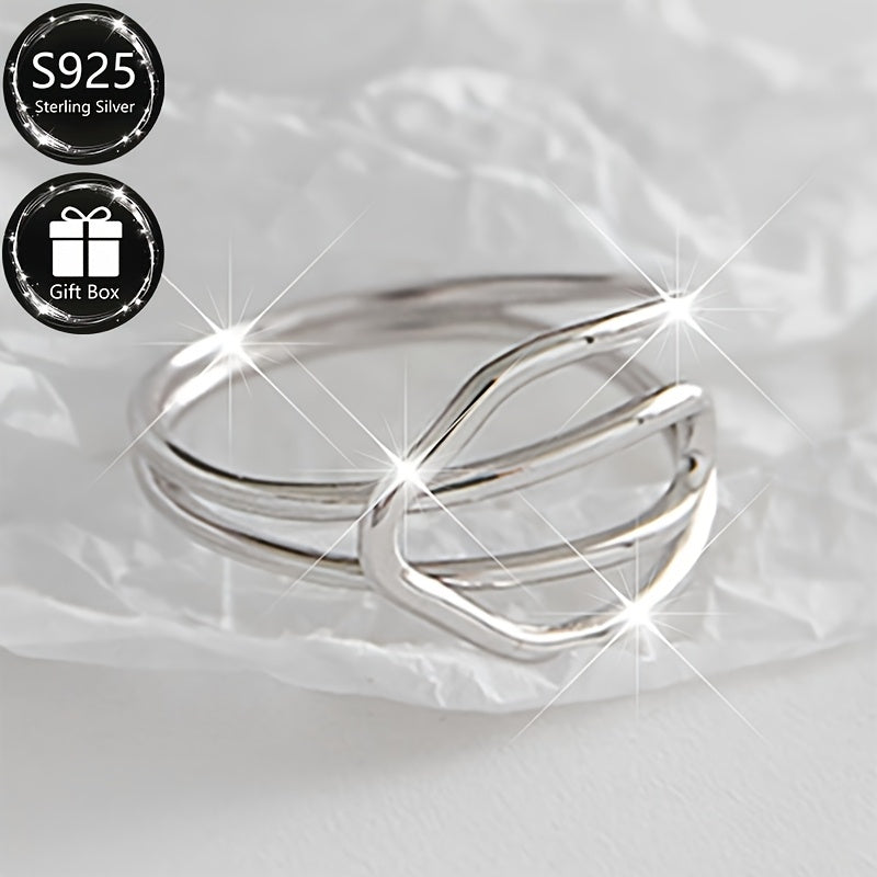 A sophisticated and simplistic adjustable open ring with a hollow line cross design in 925 sterling silver, perfect for everyday or special occasions, suitable for men and women.