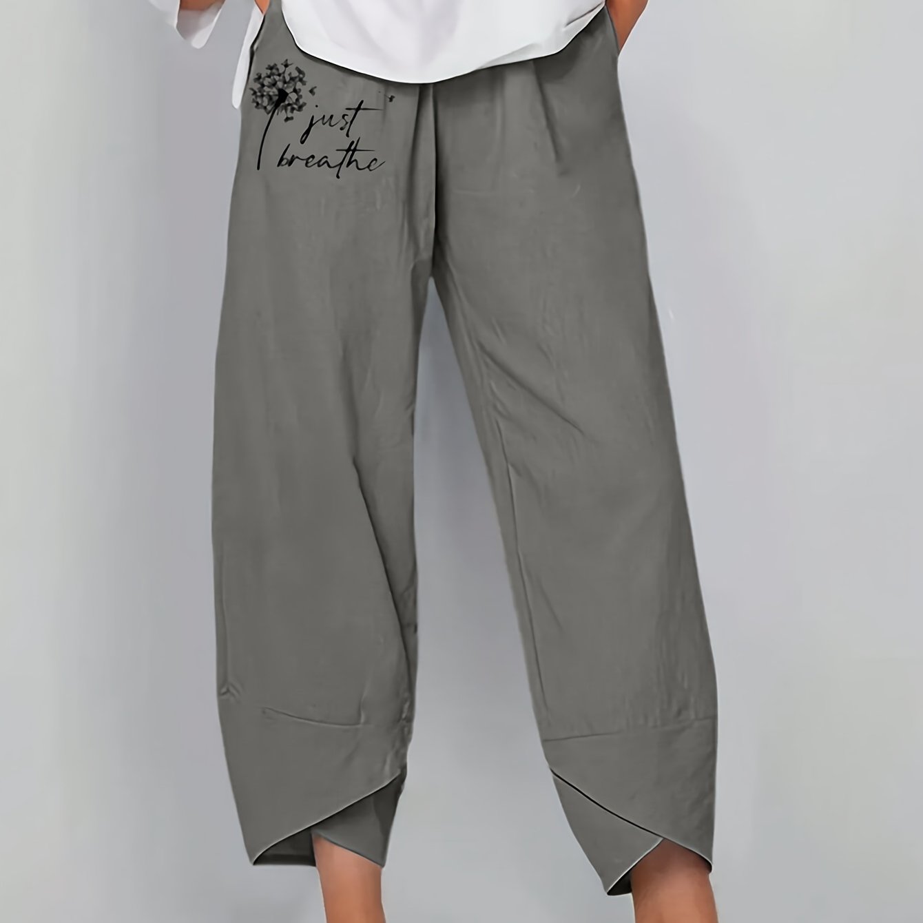 Baggy pants with dandelion print for plus size women, suitable for spring and fall.