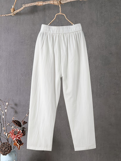 White harem style pants for plus size women, made of lightweight polyester with elastic waistband. Machine washable for spring, summer, and fall seasons.