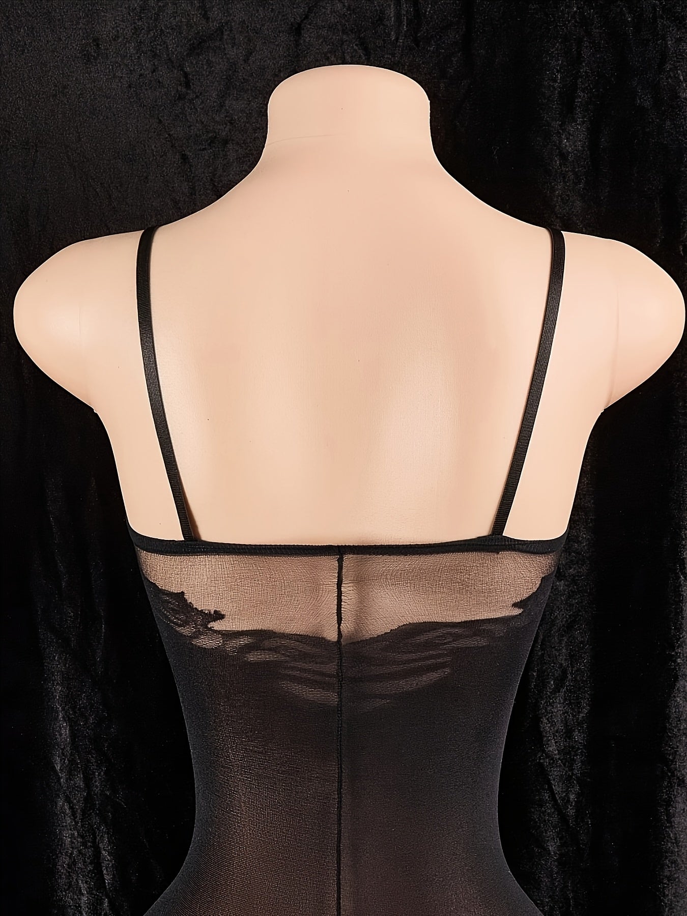 Sensual lingerie including open crotch camisole jumpsuit and bodysuits.