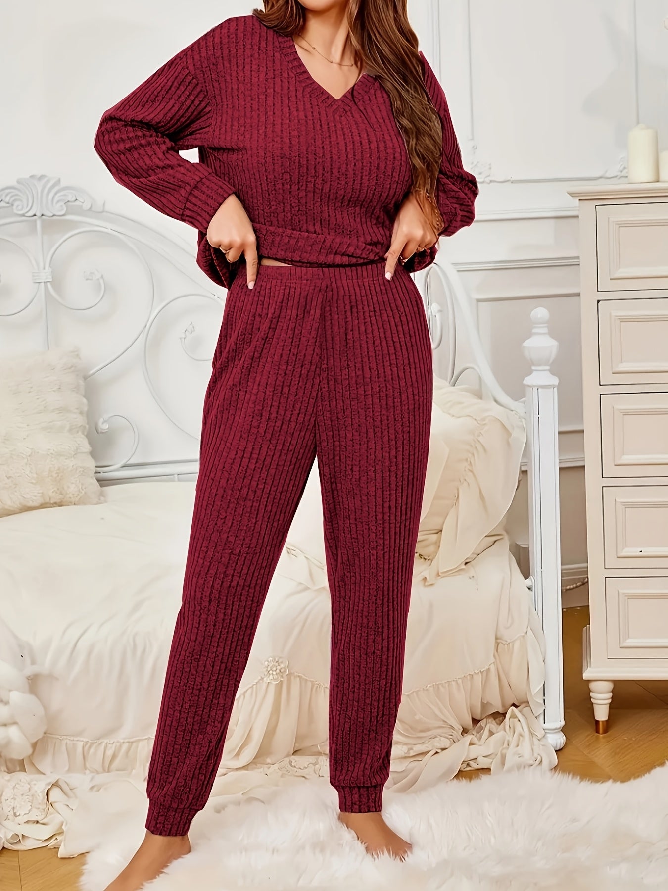 Striped loungewear set with V-neck top and pants for women's comfort in autumn/winter.