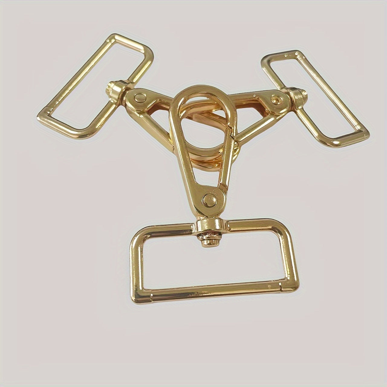 A set of 10 Gold-Tone Spring Hooks measuring 1.2" in length, featuring Thick Pads and 360° Rotation. Ideal for use with Handbag Straps and Jewelry Clasps.