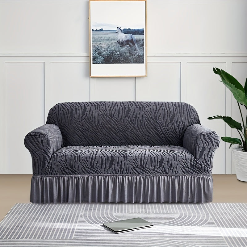 Wave pattern sofa slipcover with skirt, non-slip and dustproof. Protects furniture from cat scratches. Machine washable for easy cleaning. Suitable for bedroom, office, or living room décor.