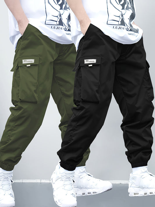 Boys' casual cargo pants with elastic waistband and multi-pocket design in durable polyester, suitable for all seasons and outdoor activities.