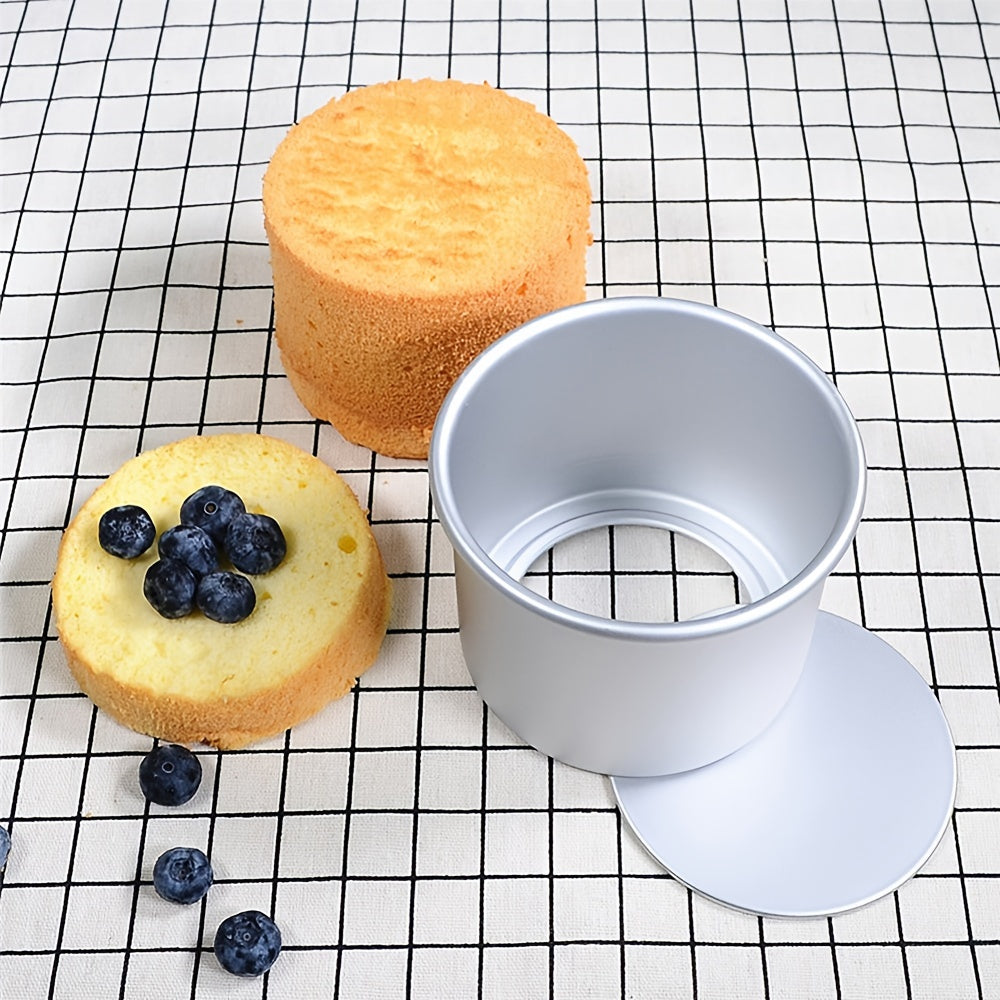 A tiny 2-inch mini aluminum golden round cake mold with removable bottom and thickened anodized base for baking DIY cakes.