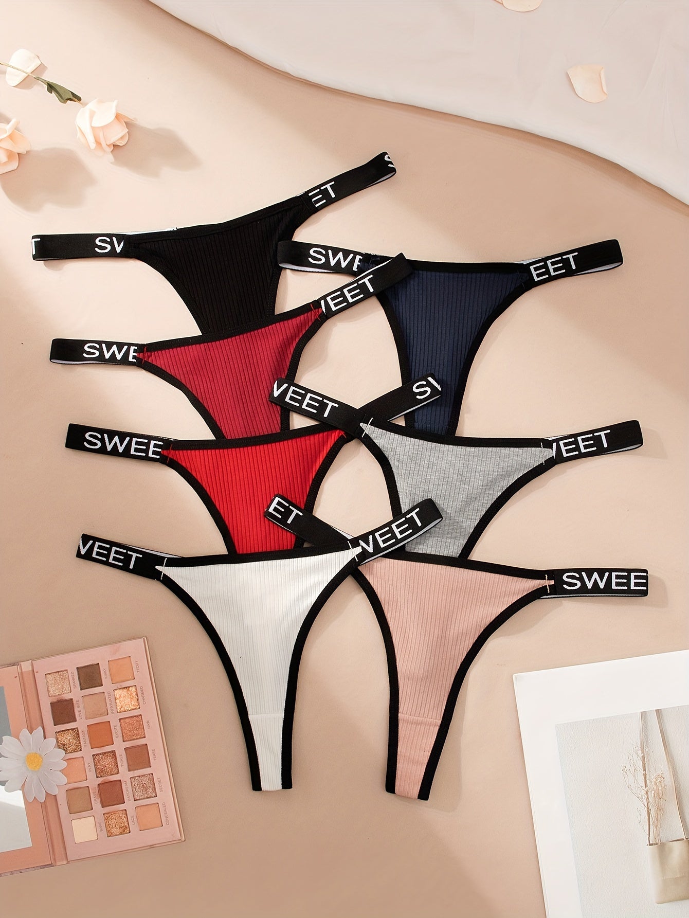 7pcs Letter Tape Contrast Binding Thongs: Sexy, comfortable, and stretchy intimates for women.