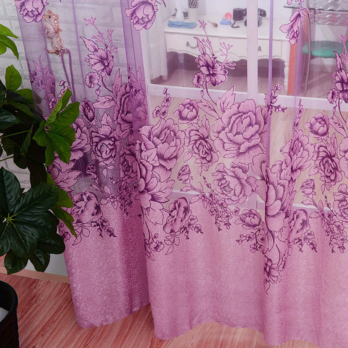 This sheer curtain features a delicate flower pattern on a single layer of translucent material, giving it a pastoral style. It is rod pocketed and does not come with a cloth lining, making it suitable for adding a touch of elegance to your living room