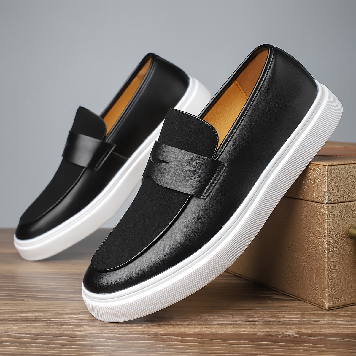 Men's preppy slip-on sneakers with low top design in solid color, featuring PU upper and inner, rubber sole, and round toe for daily wear.