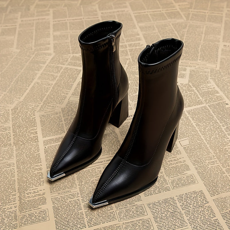 Stylish ankle boots with pointed toe, chunky heel, faux cover, and side zipper closure for all seasons.