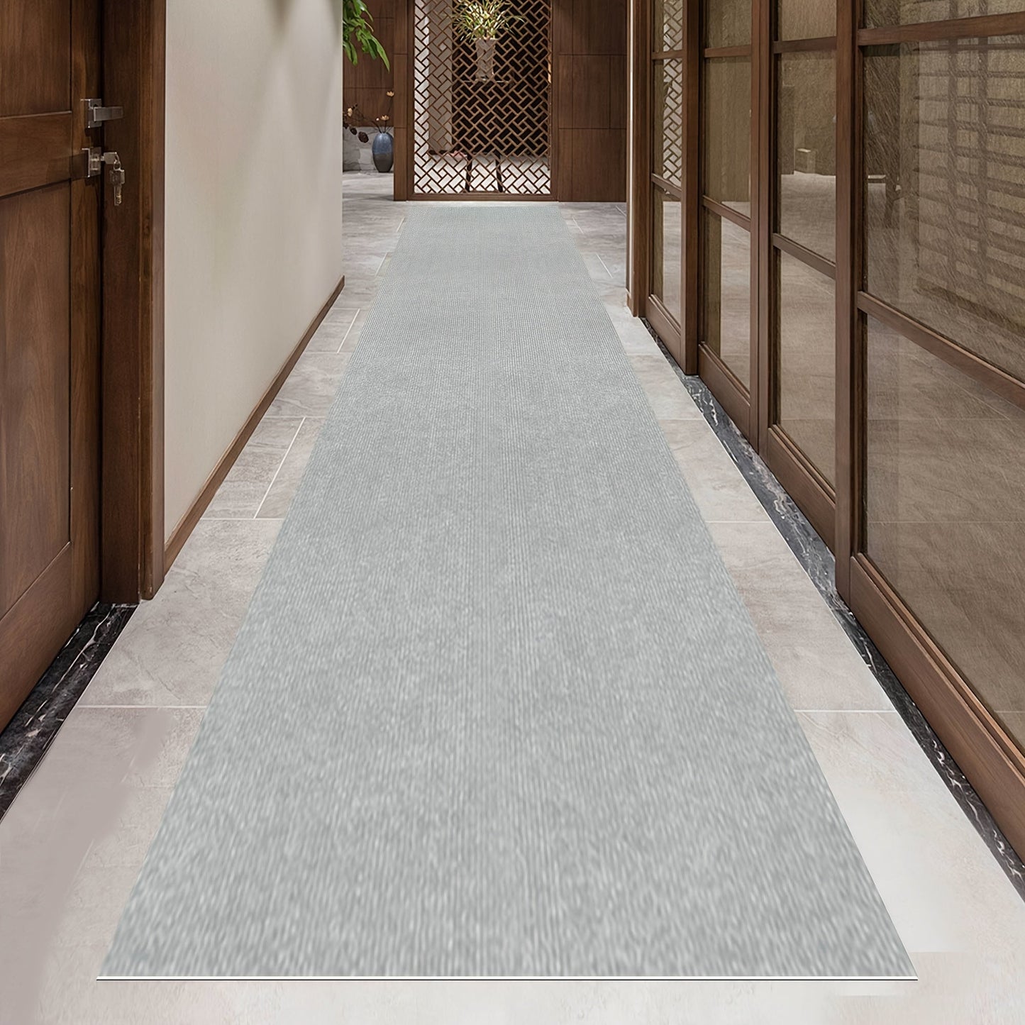 Add a touch of luxury with our Lightweight Dark Gray Striped Runner Mat. Made of non-slip, stain-resistant, and machine washable polyester, this mat is perfect for hallways, kitchens, living rooms, garages, and patios. Easy to install, it's the ideal mat