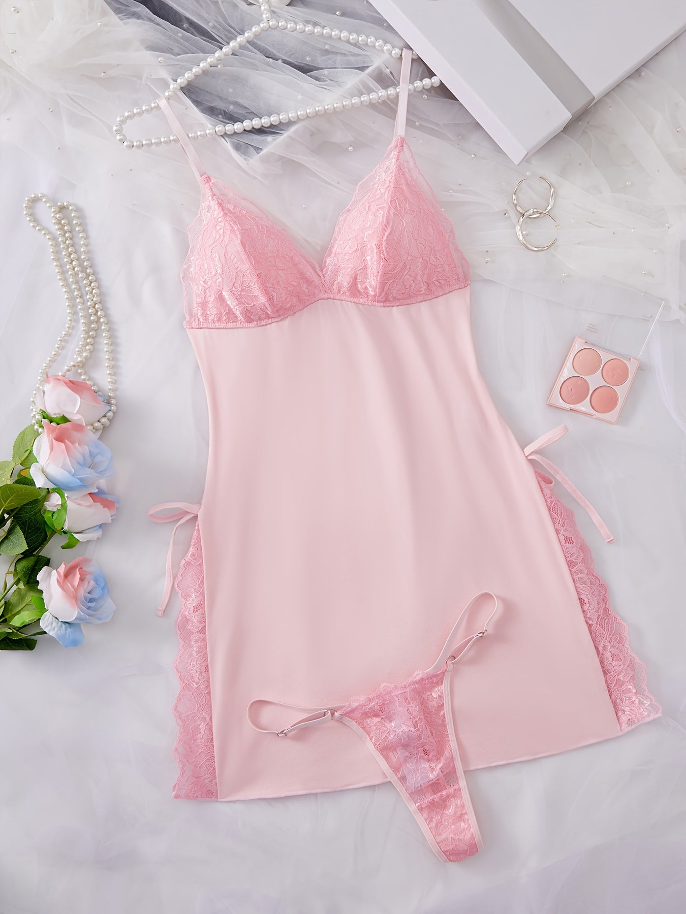 Women's sexy nightdress and panty set with V-neck, thin shoulder straps, and fashionable charm design.