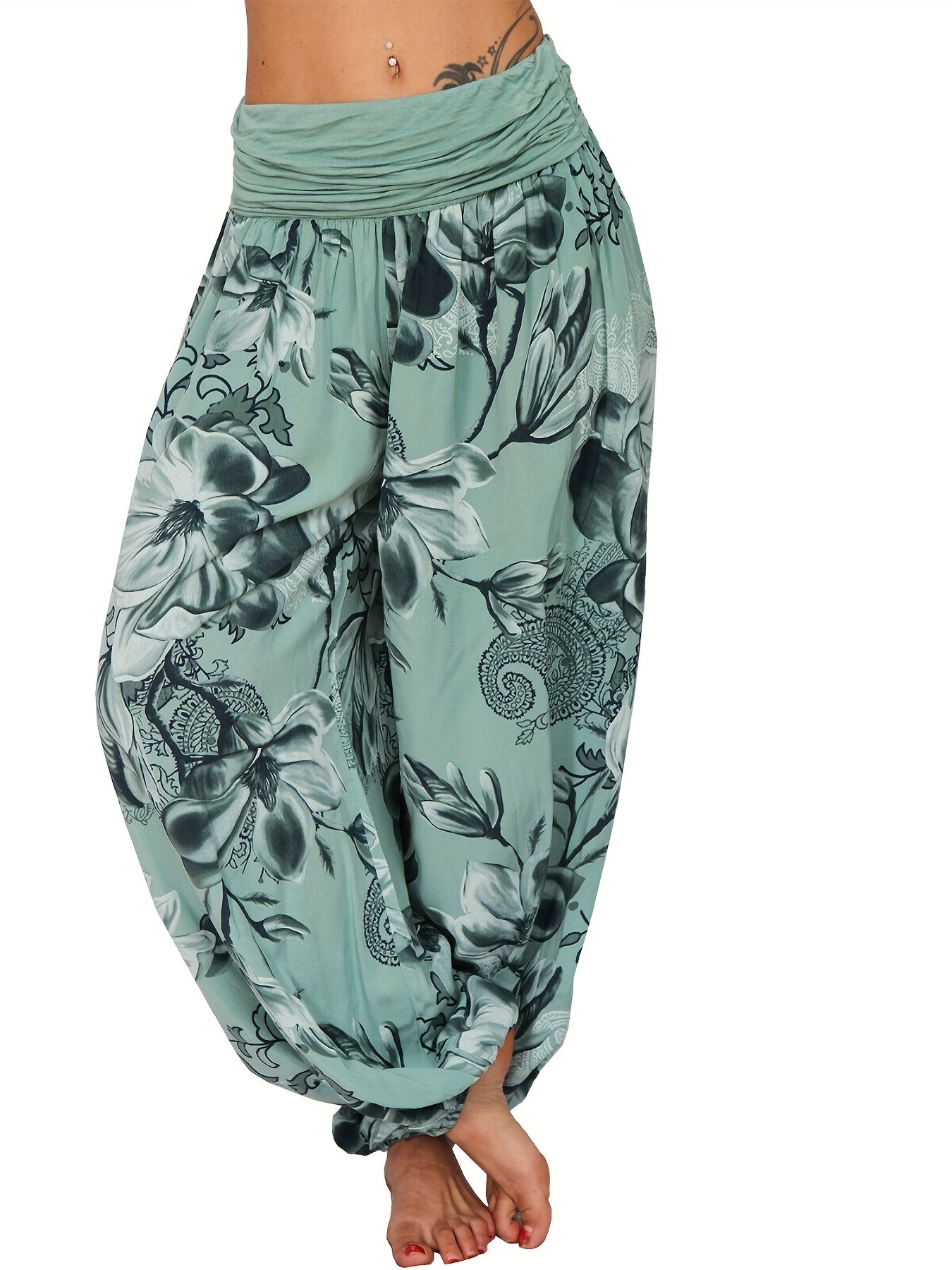 Women's floral print harem pants in blue and white, made of lightweight polyester with wide legs for a casual vacation style. Features a relaxed fit, perfect for machine washing.