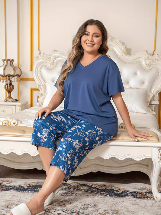 Women's summer pajama set includes a casual floral print short sleeve top and cropped pants made of 95% polyester and 5% elastane, with slight stretch knit fabric for home comfort.