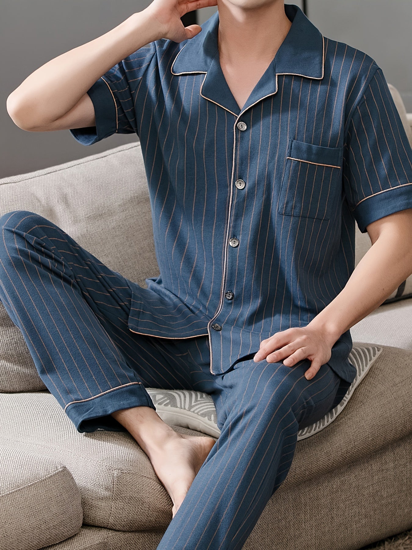 Men's navy blue stripe print pajama set with lapel collar, short sleeves, and trousers. Comfortable and skin-friendly cotton fabric for cozy loungewear.