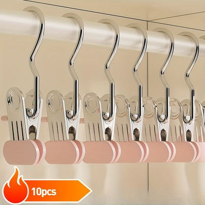 Ten metal clothes hangers with a polished finish and multi-functional broadened no-crease clips for hats, straps, and jeans. These durable anti-slip portable clamps are perfect for hanging socks.