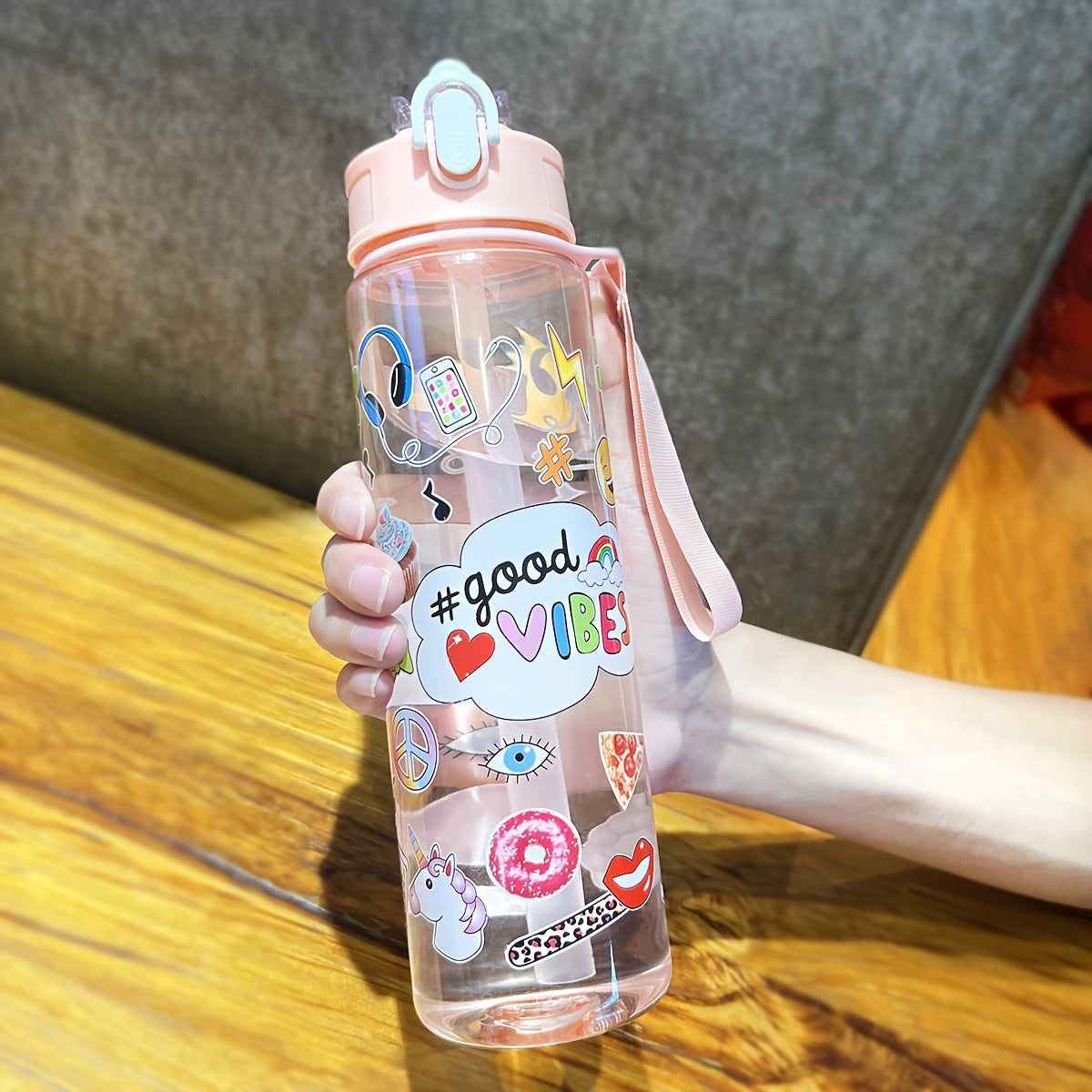 WhimsyWorks Cartoon Unicorn & Astronaut leak-proof water bottle made of PVC-free plastic for outdoor activities. Easy-open lid, hand wash only. Portable with woven handle, perfect for picnics, cycling, running, exercise. Great Christmas, Halloween