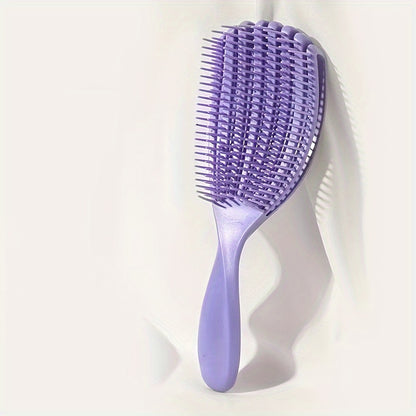 Wet and dry use shell comb with large curved fluffy style for smooth, knot-free hair. Features eight-claw massage design.