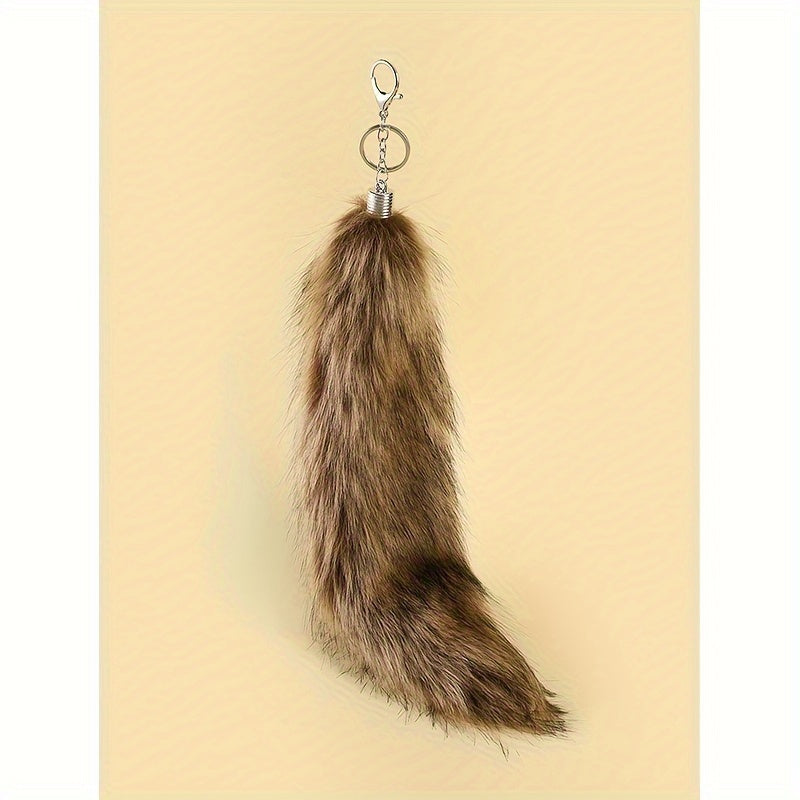 Large Faux Fox Tail Keychain for Women, made with Flannelette Fur and designed as a Carry Bag Keyring. This Novelty Fashion Accessory features a Lobster Claw Closure and is a Decorative Keyring perfect for Birthday Gifts.