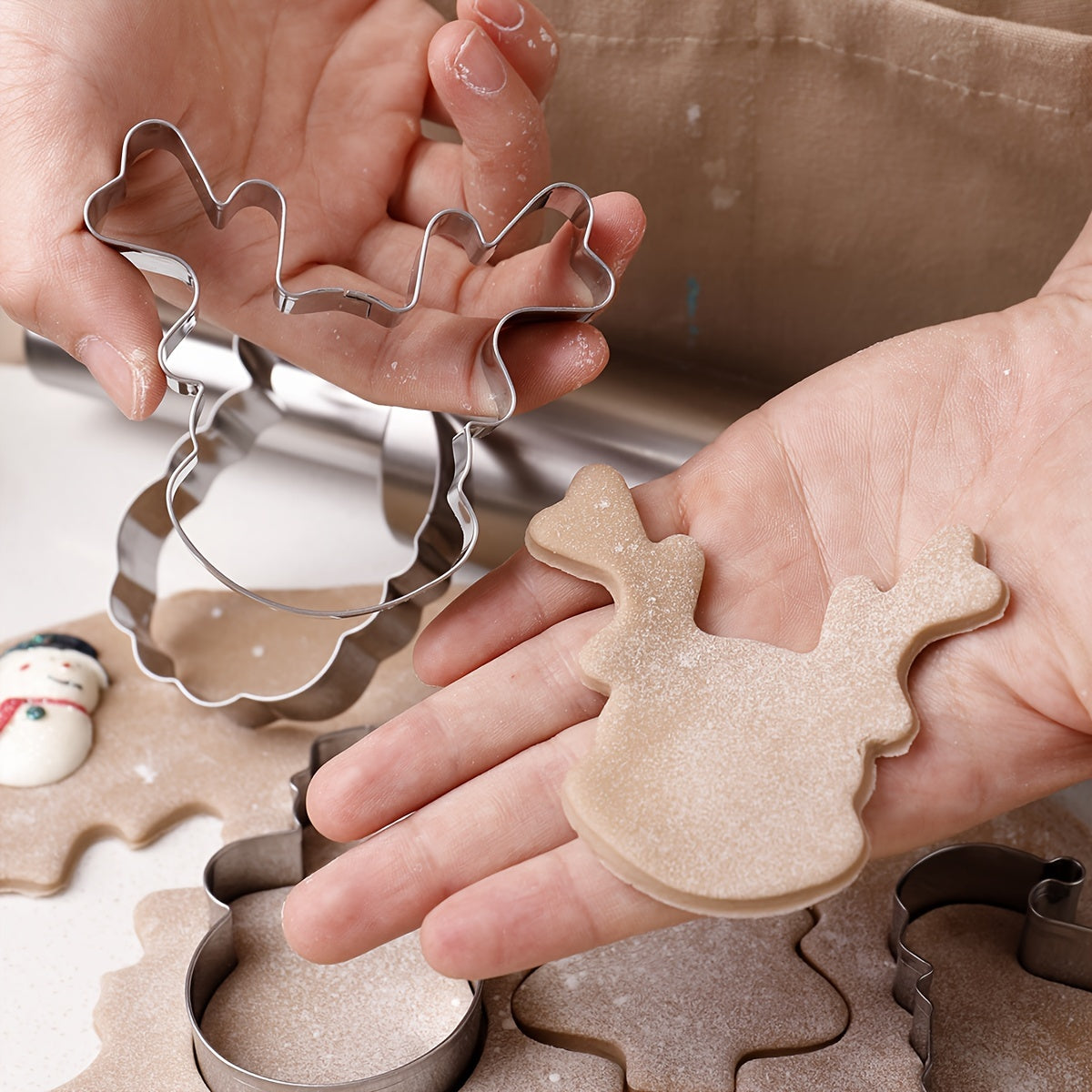 Get into the holiday spirit with our 12-piece Christmas cookie cutter set! Made of durable stainless steel, these festive molds include Christmas-themed shapes perfect for baking holiday cookies, gingerbread, and candy. Add some cheer to your kitchen