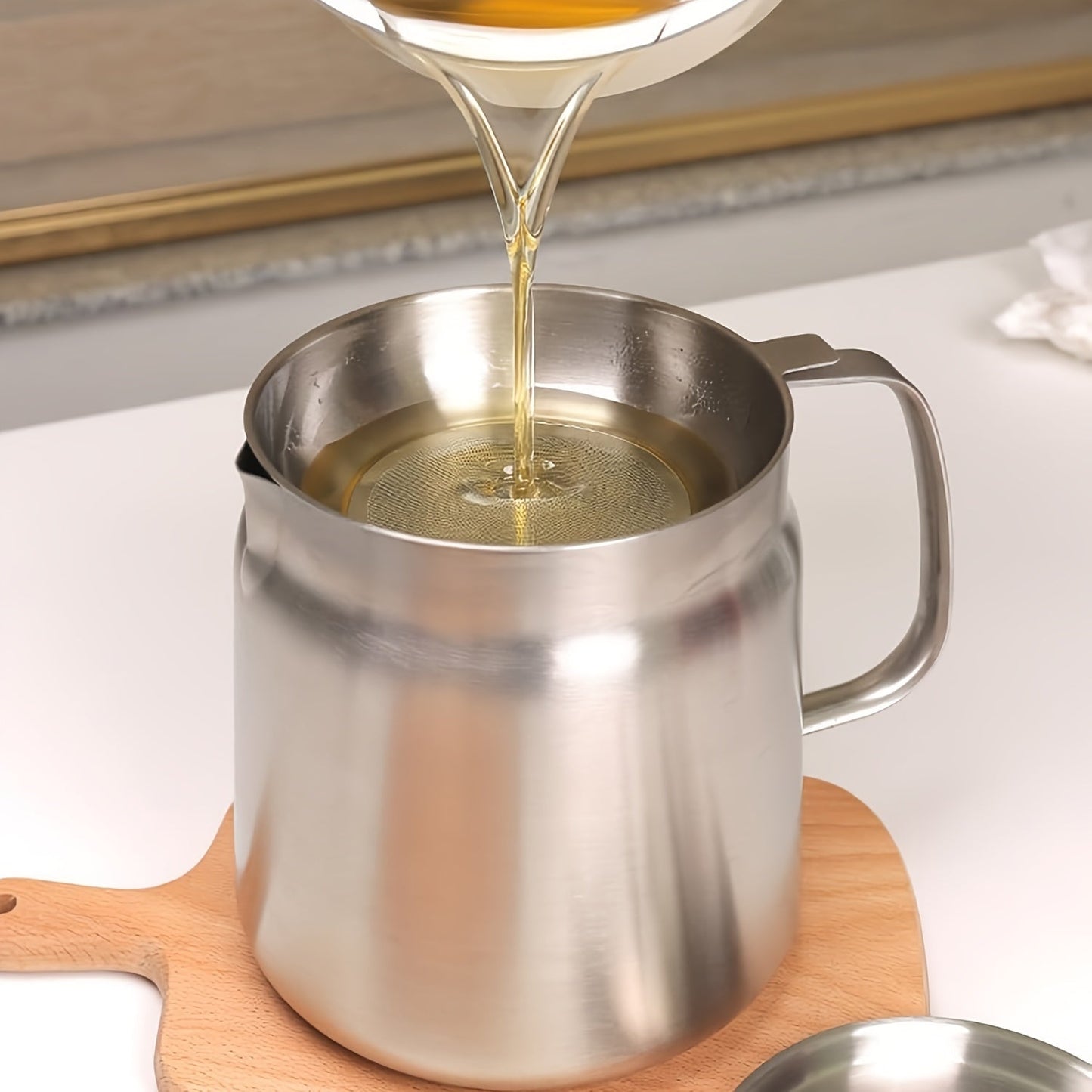 Get your hands on this Oil Pot made from 304 Stainless Steel that comes with a Drainer Basket. With a Large Capacity and a Multipurpose design, it is ideal for storing Grease, Cooking Oil, and more. The Non-Leakage and Drip-Free design make it perfect