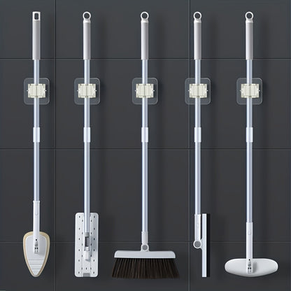 5-piece wall-mounted mop and broom holder with self-adhesive rack. Waterproof, non-slip, and practical for organizing home, bathroom, kitchen, garden, and garage.