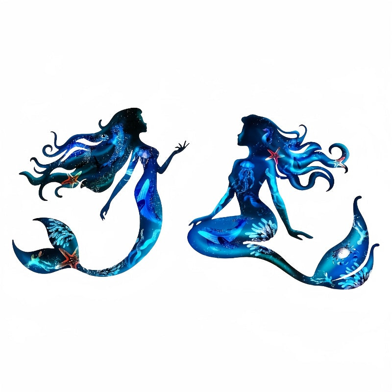 Ocean-themed metal mermaid wall art for indoor or outdoor nautical decor.