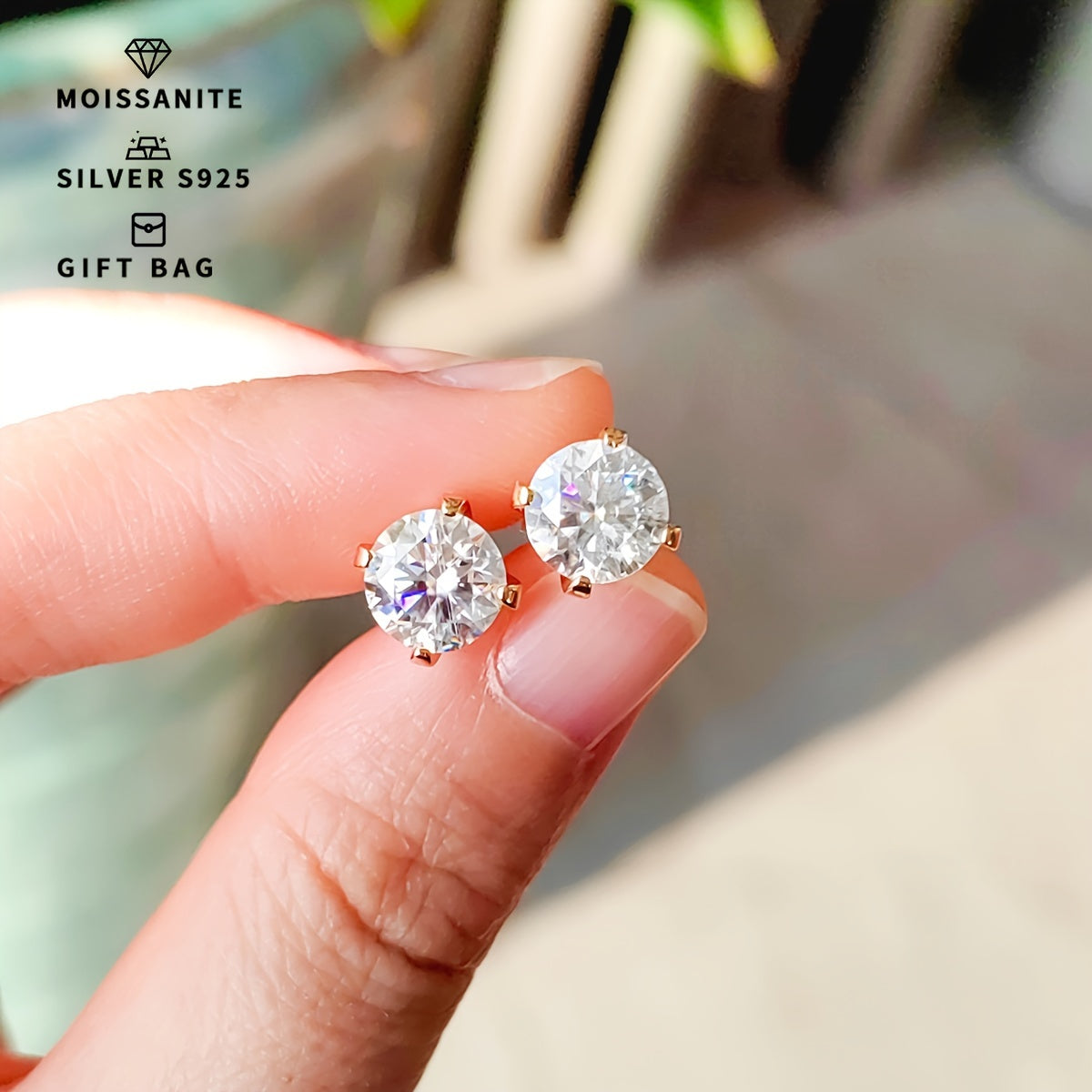 Elegant and fashionable women's jewelry - a pair of S925 silver earrings with platinum and gold plating, featuring round white moissanite stones in a simple 4-prong setting. Available in sizes ranging from 0.3CT to 3CT.