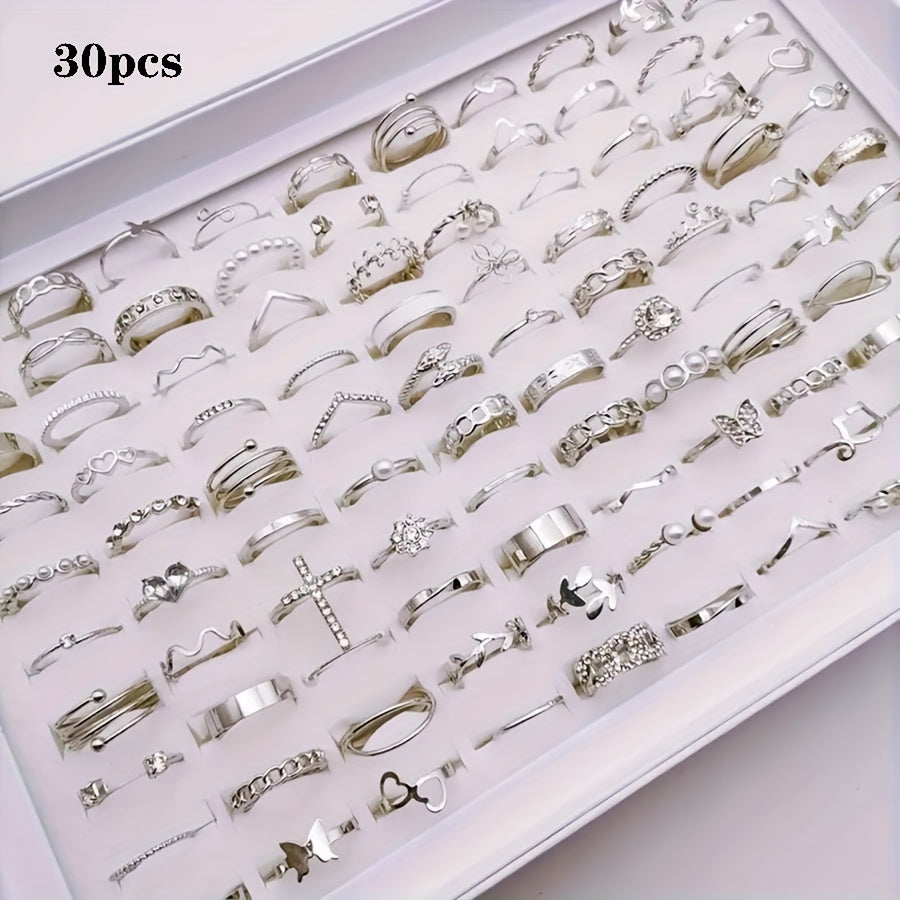 Pack of 30 simple butterfly love alloy rings for women, featuring an elegant and versatile mixed style. Perfect for party, wedding, or daily wear. Each set includes multiple pieces. Rings will be randomly shipped in OPP bag packaging.