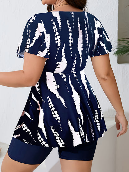 Navy Blue & White Abstract Print Tankini Set for Plus Size Women, V-Neck Top with Ruched Detail, Solid Black Shorts. Made of High-Stretch Polyester/Elastane Blend, Machine Washable.