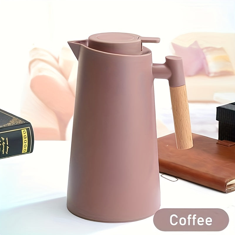 Dual-layer vacuum insulated coffee pot with wooden handle. Ideal for hot and cold beverages, requires no electricity.