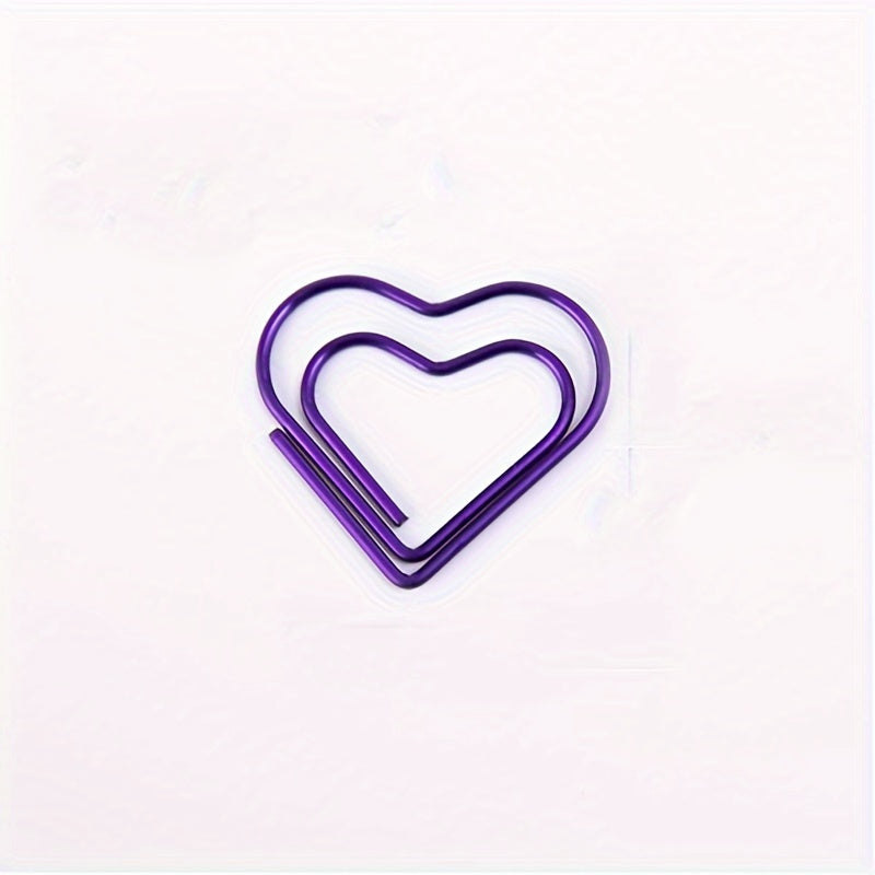 50 colorful heart-shaped paper clips for organizing documents and files.