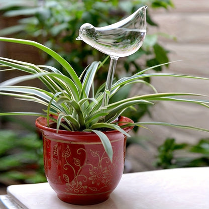 5 bird-shaped self-watering globes for indoor and outdoor plants.