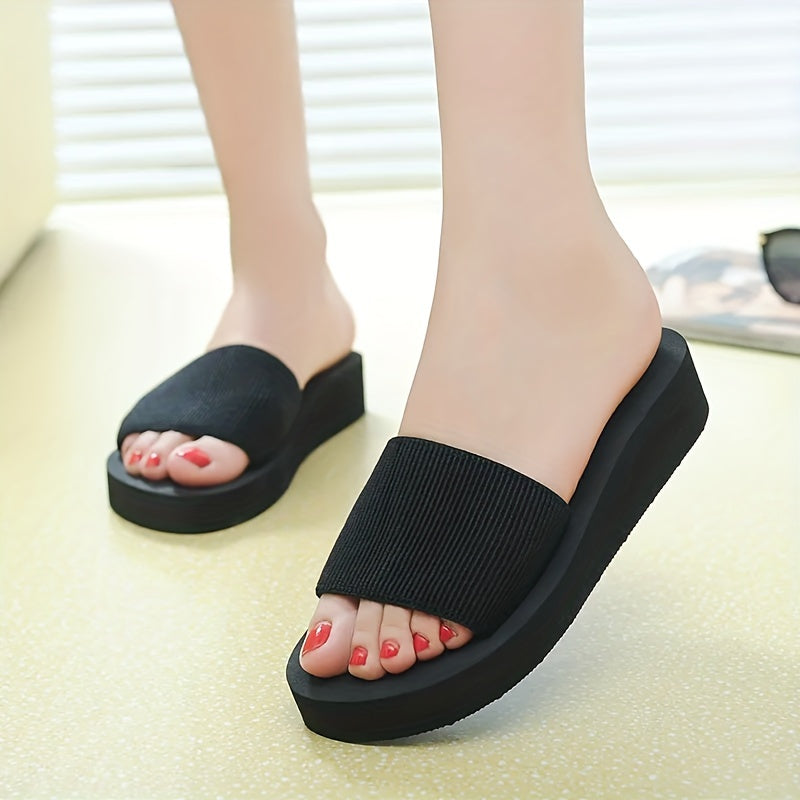 Women's black elastic flip-flops with solid color design, slip-resistant sole, comfortable indoor/outdoor wear with EVA sole and fabric material.