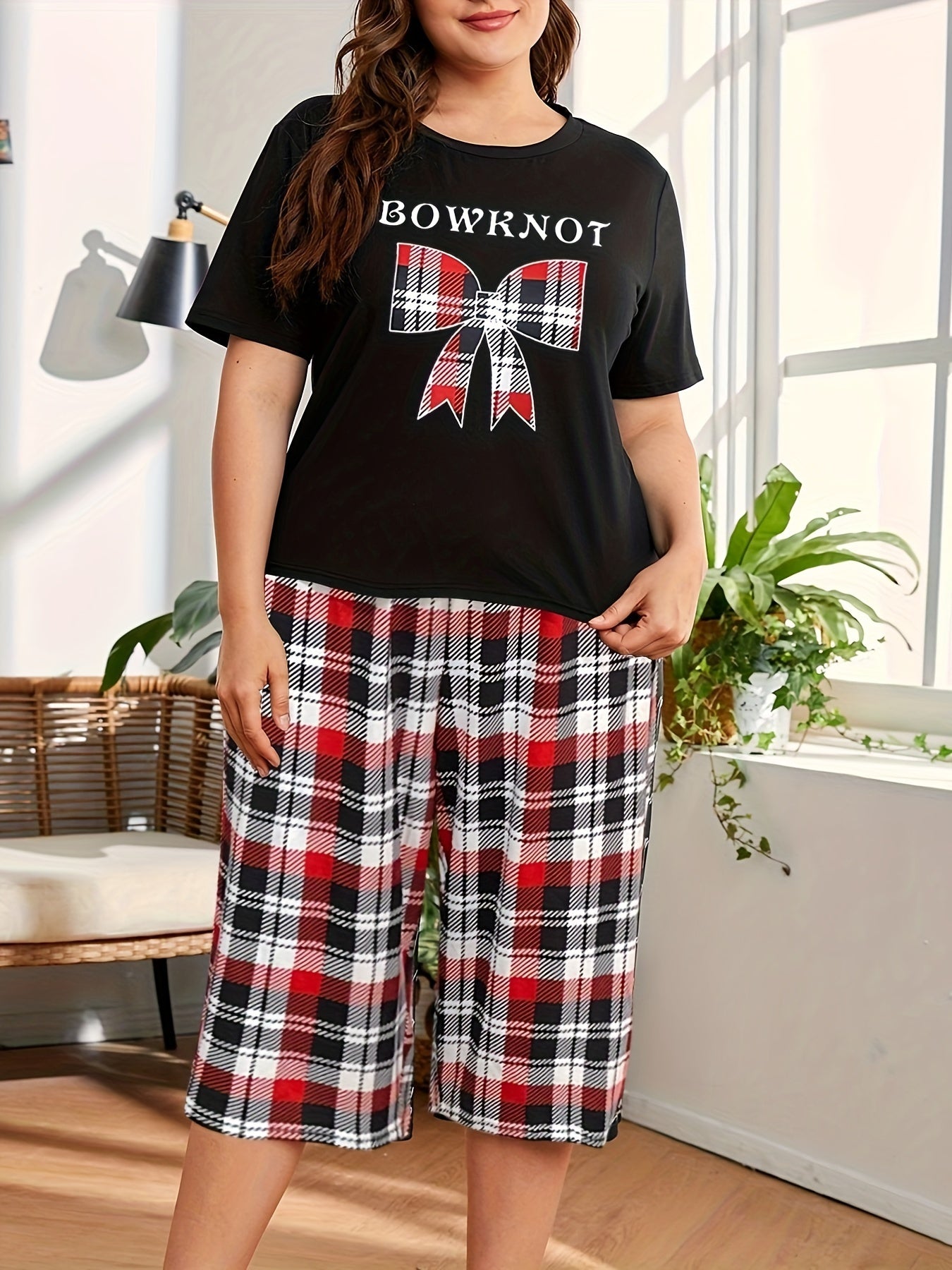 Women's casual clothing set with bowknot and plaid print, featuring a short sleeve round neck top and capri pants for a comfortable relaxed fit.