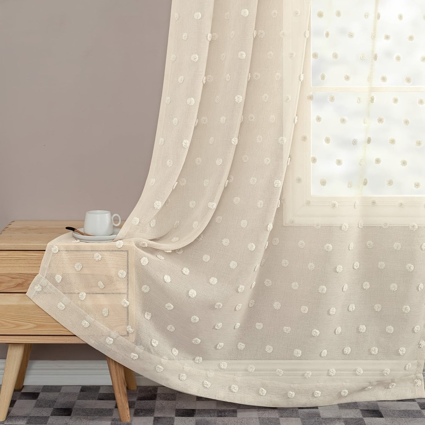 Sheer panel with rod pocket top featuring boho-style polka dot embroidery - crafted from imitation hemp fabric. This machine-washable drapery offers room darkening benefits for a variety of living spaces. With easy hanging and a fresh minimalist design