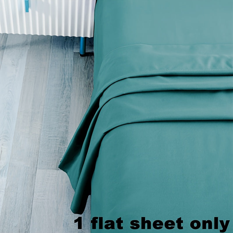 Soft and luxurious 100% microfiber flat sheet in a solid color with a brushed finish - Easy to care for with machine washable material, perfect for any bedroom or guest room.