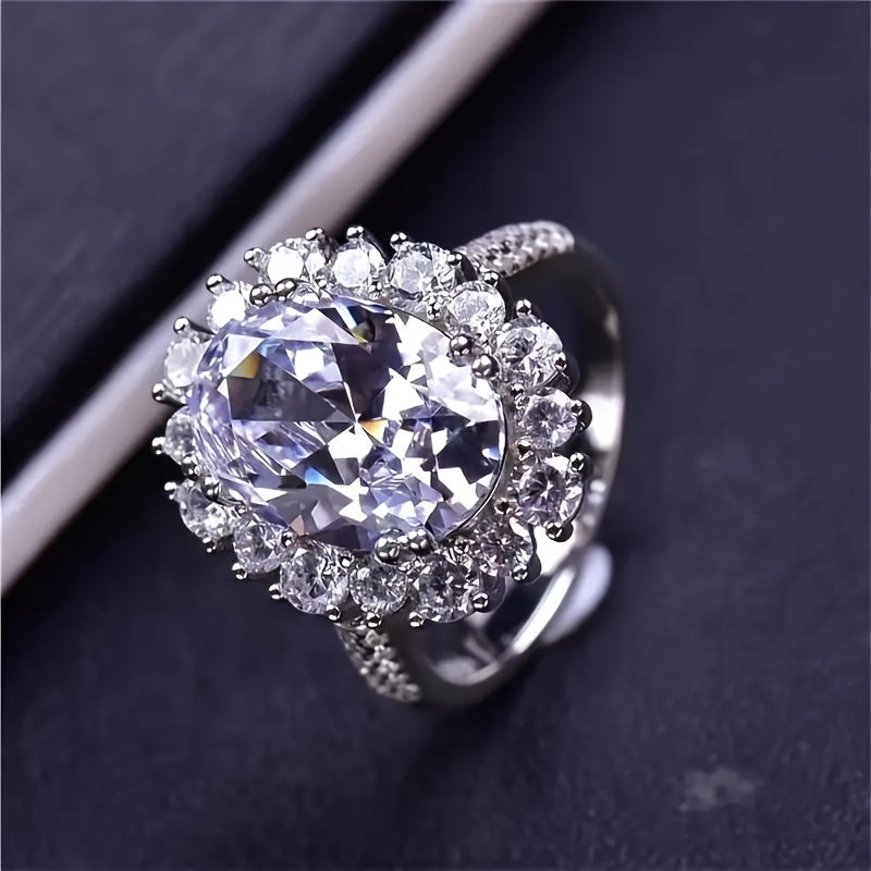 This stunning S925 silver ring features an 8 carat oval cut Moissanite stone, making it the perfect gift for a father on special occasions such as engagements, weddings, birthdays, parties, and festivals. Its egg-shaped design adds a touch of elegance