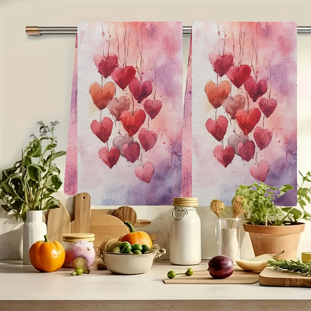 2 pieces of ultra soft kitchen towels featuring a Valentine's Day heart design. These highly absorbent and machine washable dish hand towels showcase romantic pastel hearts with balloons. Each towel measures 40.64x60.96 cm, making them perfect for