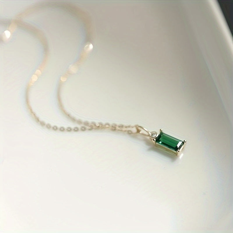 Stylish Emerald Green Princess Square Necklace made of 2.1g of high-quality 925 Sterling Silver featuring a dazzling Cubic Zirconia Pendant. This Elegant Clavicle Chain is ideal for everyday wear or as a thoughtful gift. Representing the August