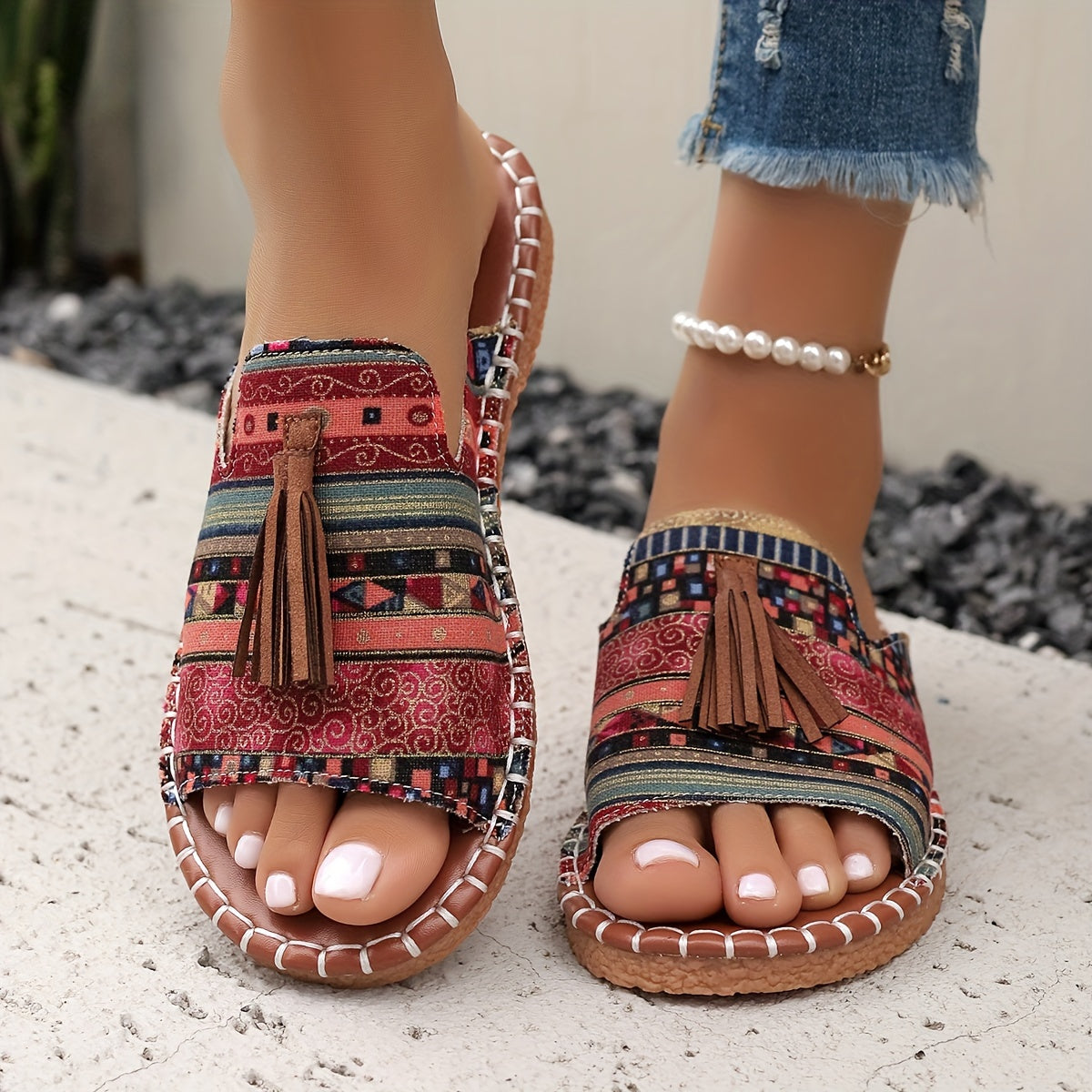 Bohemian canvas sandals with tassel and ethnic pattern, comfy slip-on slides for summer.