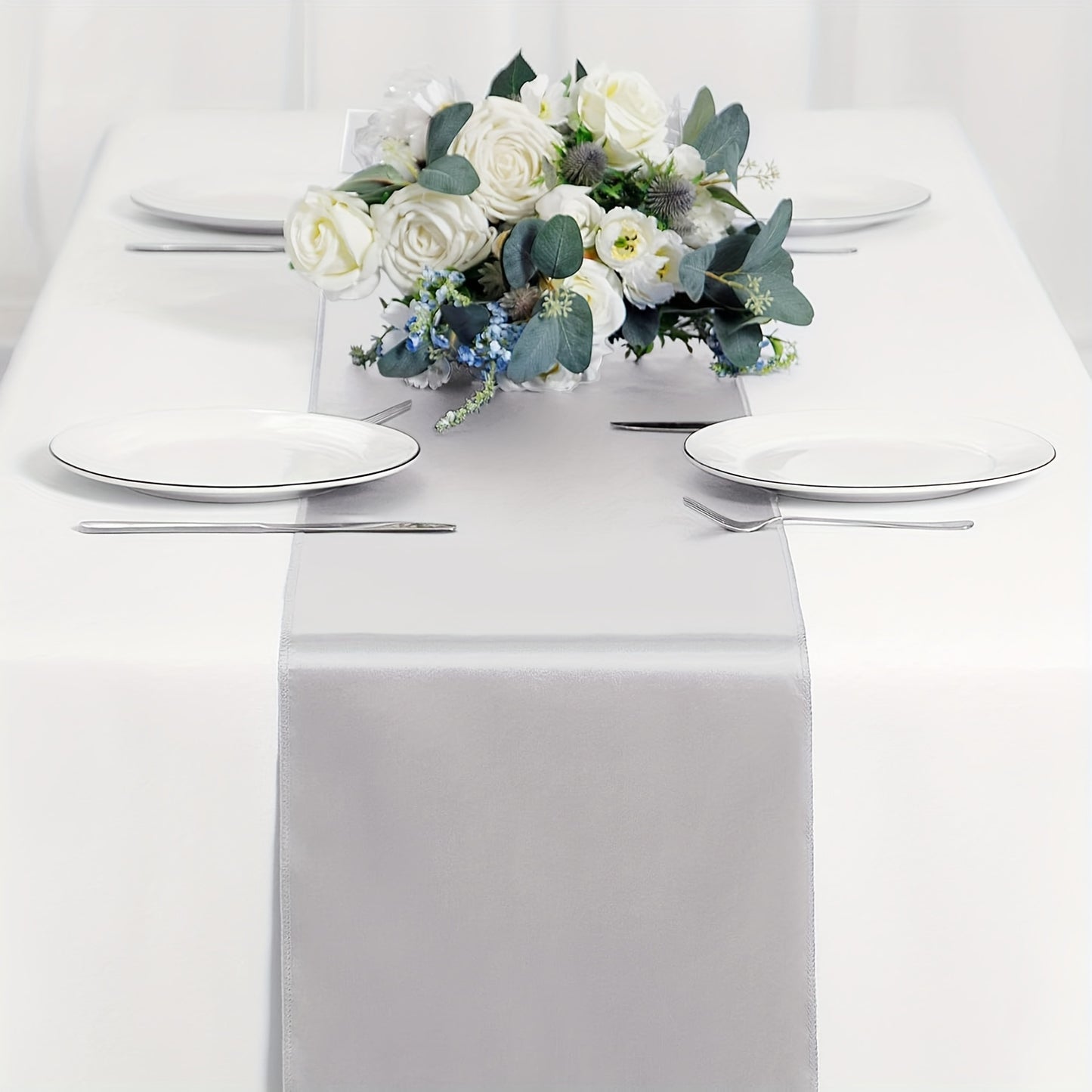 Elegant light blue satin table runner, 30.48 x 274.32 cm, ideal for weddings and formal events.