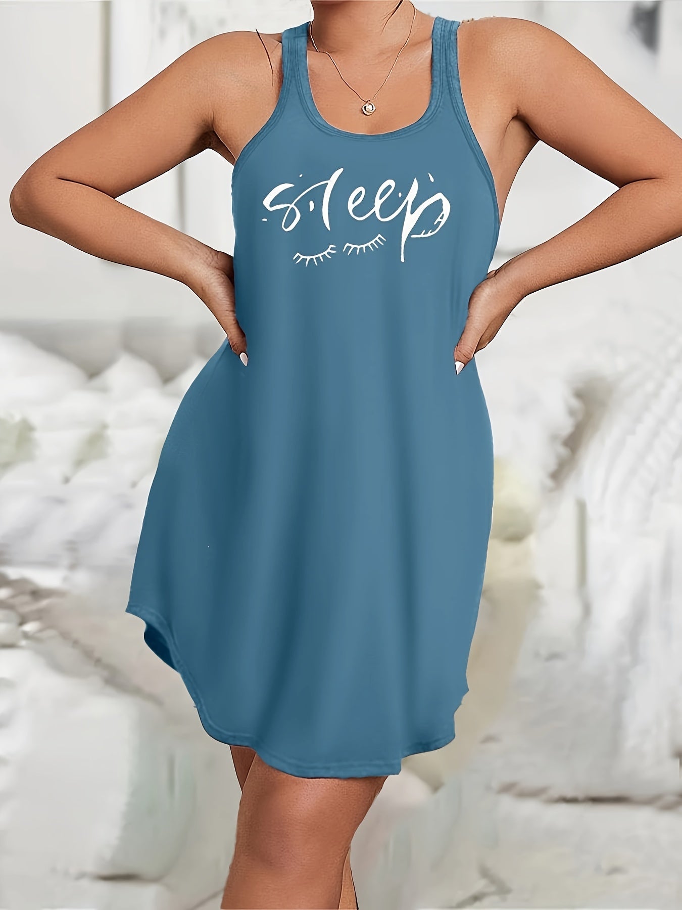 Plus size loungewear dress with scoop neck and racer back, featuring eyelash and letter print.