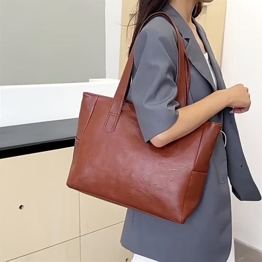 Spacious PVC tote bag for women in light brown, gray, and black. Features secure zip closure, decorative stitching, and versatile style. Ideal gift for friends, girlfriends, and moms.