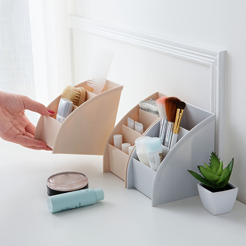 Pocket folder with grid remote control box for organizing cosmetics on desktop.