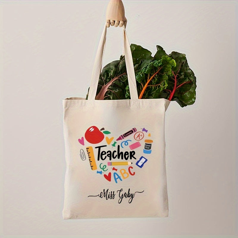 Customized shoulder bag with personalized name, featuring a lovely "Teacher Love Inspire" print on durable canvas material. The perfect back to school gift for teachers.