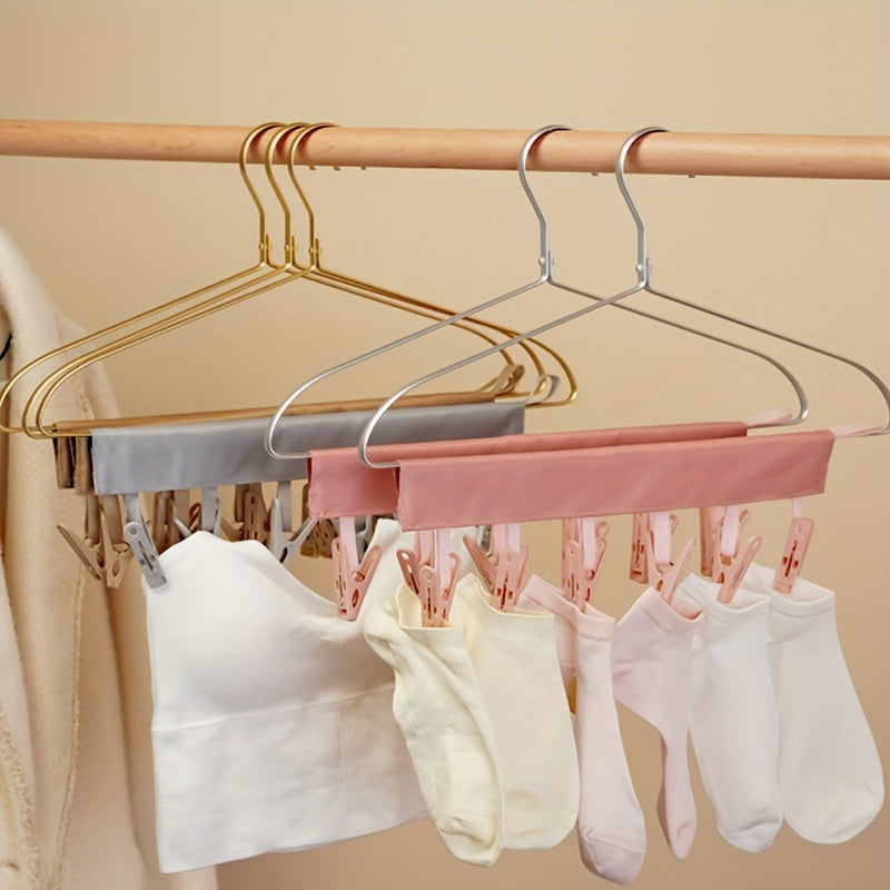 Traveling soon? Check out our 2-piece set of Portable Fabric Clothes Hangers, perfect for hanging your clothes and accessories on the go. Our multifunctional folding Clothes Clips are ideal for drying socks and underwear in hotel rooms or while